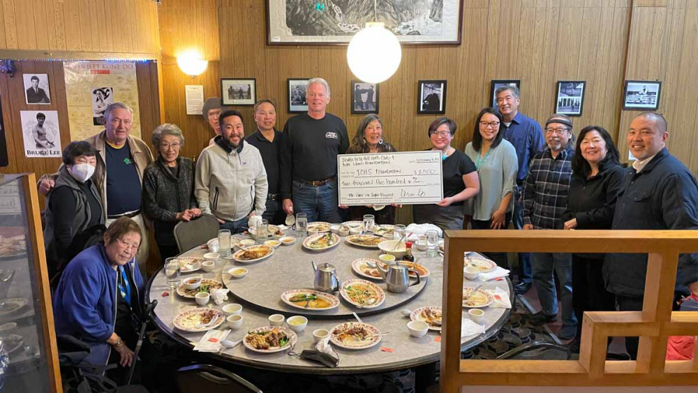 Seattle First Hill Lions present the $2,500 donation to Janni Sun