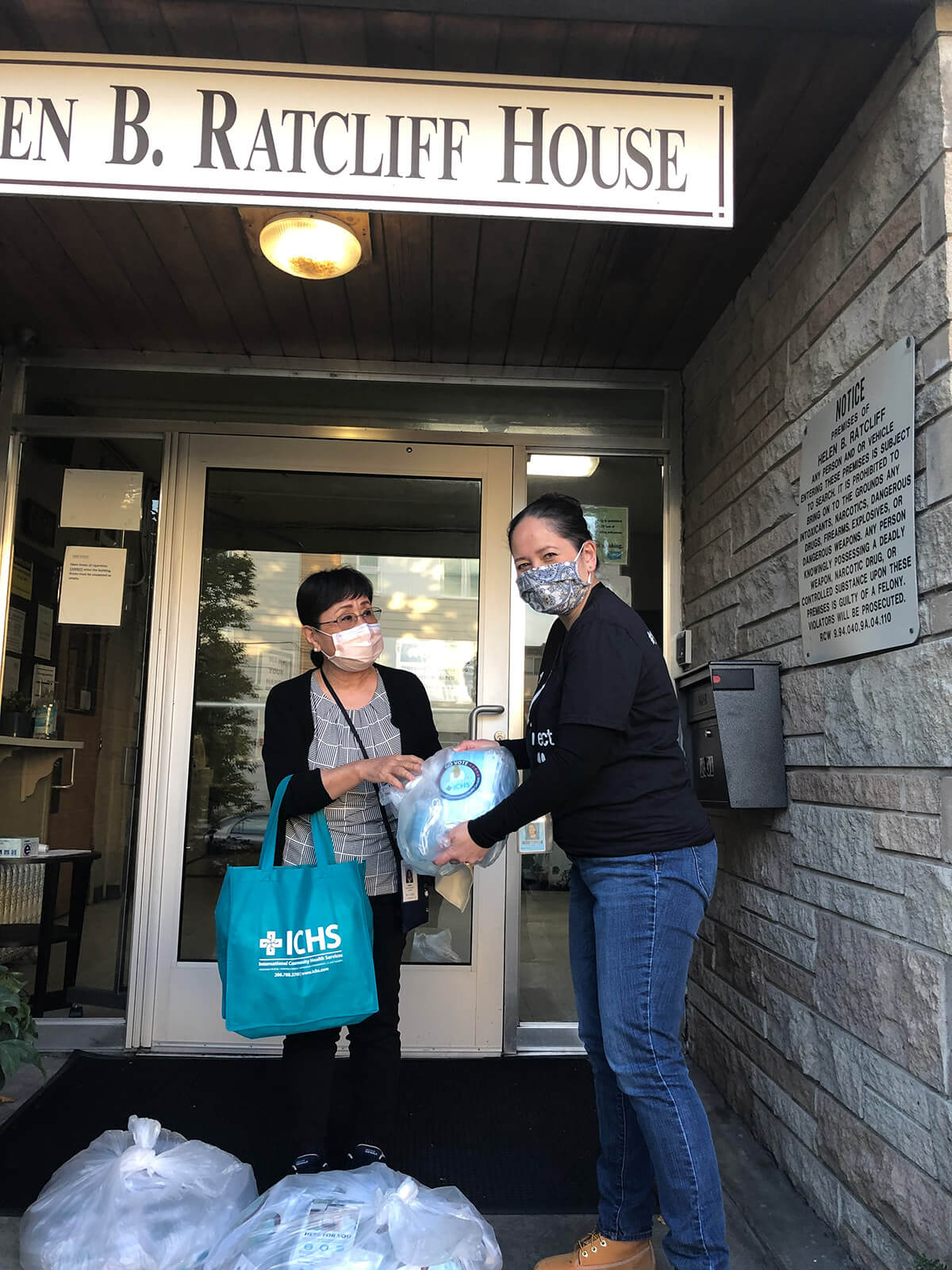 ICHS staff standing in front of the Helen B. Ratcliff House