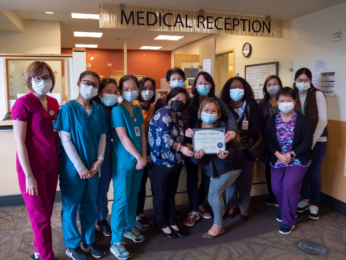 ICHS Holly Park Staff Hold Certificate