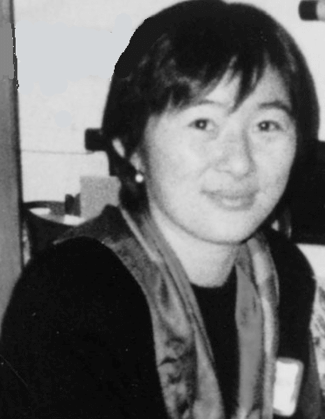 Gail Tanaka smiling in a black and white photo